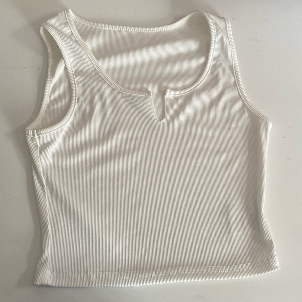 White SHEIN crop top, don’t feel like an sx, more like a medium.